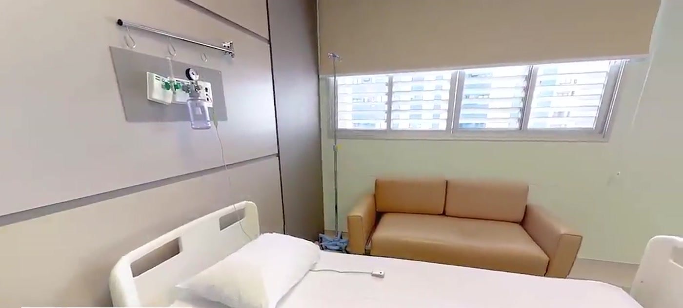 Apartamento de internação do Hospital Granja Julieta, com leito e sofá para acompanhante
